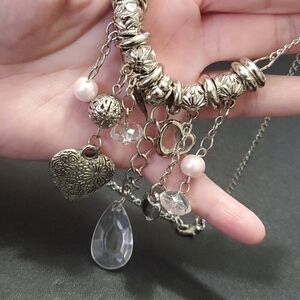 Silver tone dangling charms necklace 22-24"